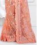 Picture of Beautiful Light Orange Net Saree