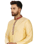 Picture of Well Formed Cream Kurtas