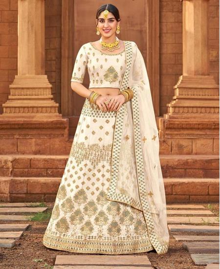 Picture of Taking Off White Lehenga Choli