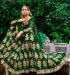 Picture of Fascinating Net Dark Green Lehenga Choli