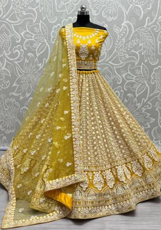 Picture of Ideal Net Golden Lehenga Choli