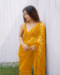 Picture of Well Formed Net Dark Golden Rod Saree
