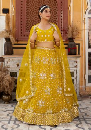 Picture of Nice Net & Silk Dark Golden Rod Lehenga Choli