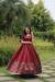 Picture of Good Looking Silk Maroon Readymade Gown