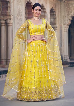 Picture of Elegant Net Yellow Lehenga Choli