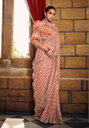 Picture of Exquisite Georgette Coral Saree