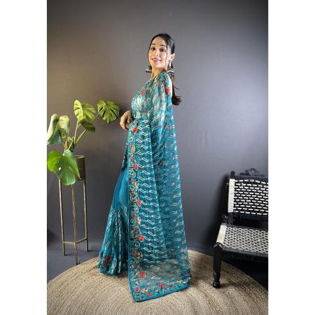 Picture of Shapely Net Teal Saree